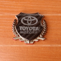 Эмблема-герб Toyota
