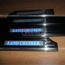 Хромовые накладки порогов салона с логотипом-подсветкой Land Cruiser